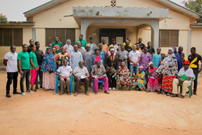 A group of people posing for a photoDescxxxription automatically generated